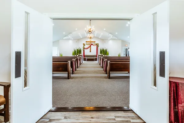 a living room with fireplace furniture and a flat screen tv