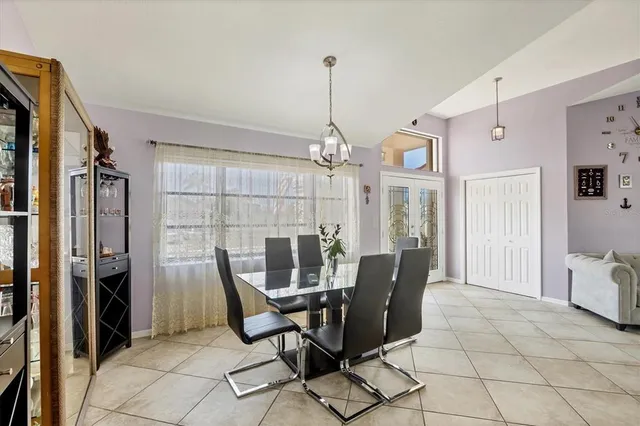 a view of a dining room with furniture