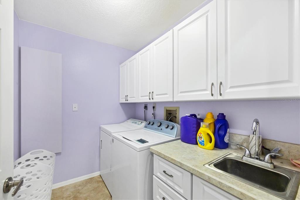 4 Leeward Drive Placida, FL 33946 - Photo 23 of 37 a utility room with dryer and washer