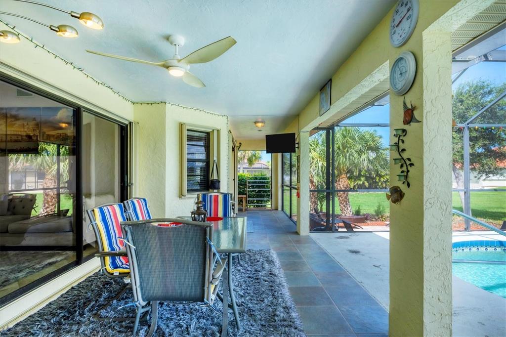 4 Leeward Drive Placida, FL 33946 - Photo 24 of 37 a view of a dining room with furniture water view and a potted plant