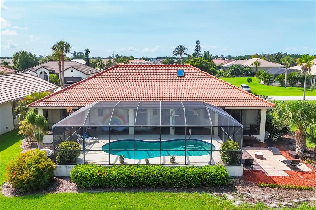 4 Leeward Drive Placida, FL 33946 - Photo 33 of 37 a view of a house with backyard and sitting area
