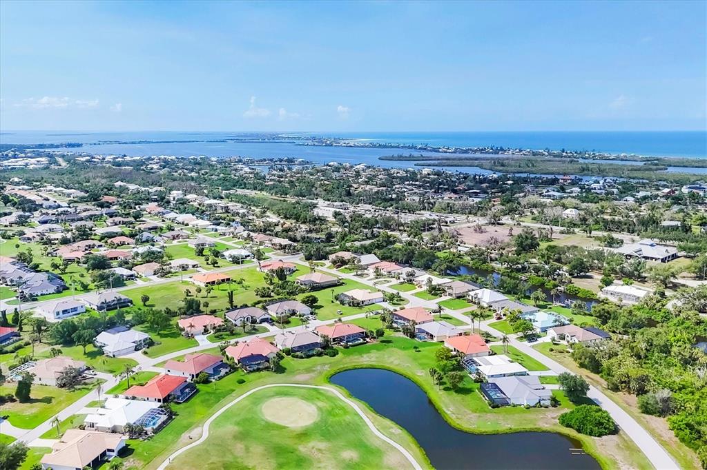 4 Leeward Drive Placida, FL 33946 - Photo 36 of 37 an aerial view of residential houses with outdoor space and trees