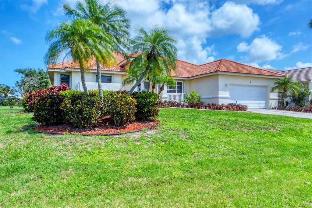 4 Leeward Drive Placida, FL 33946 - Photo 6 of 37 a front view of house with yard and green space