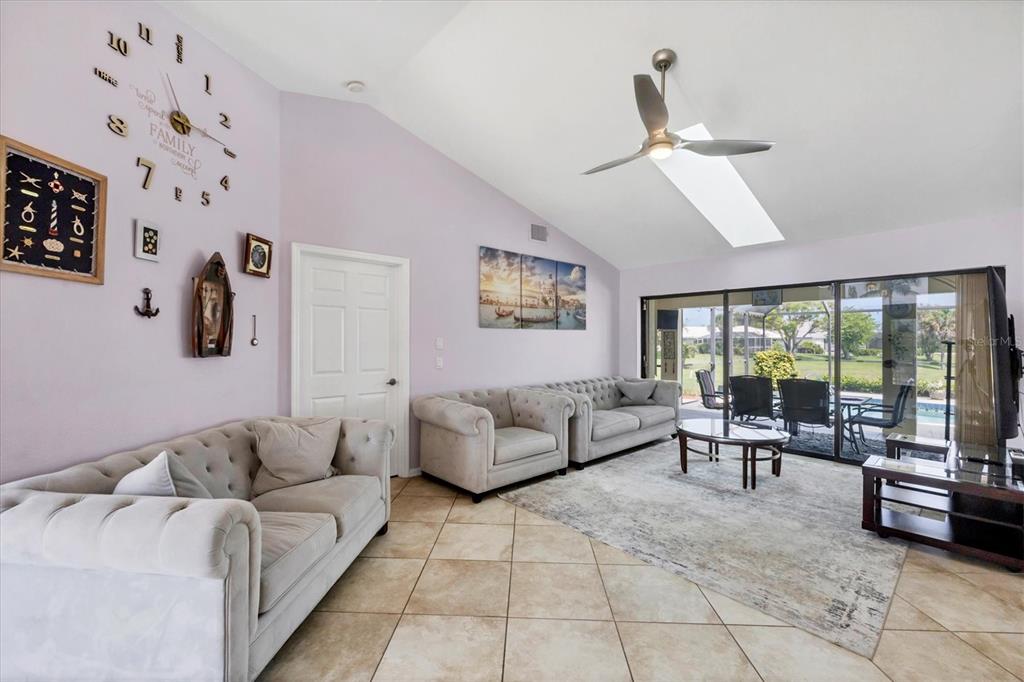 4 Leeward Drive Placida, FL 33946 - Photo 9 of 37 a living room with furniture and a large window