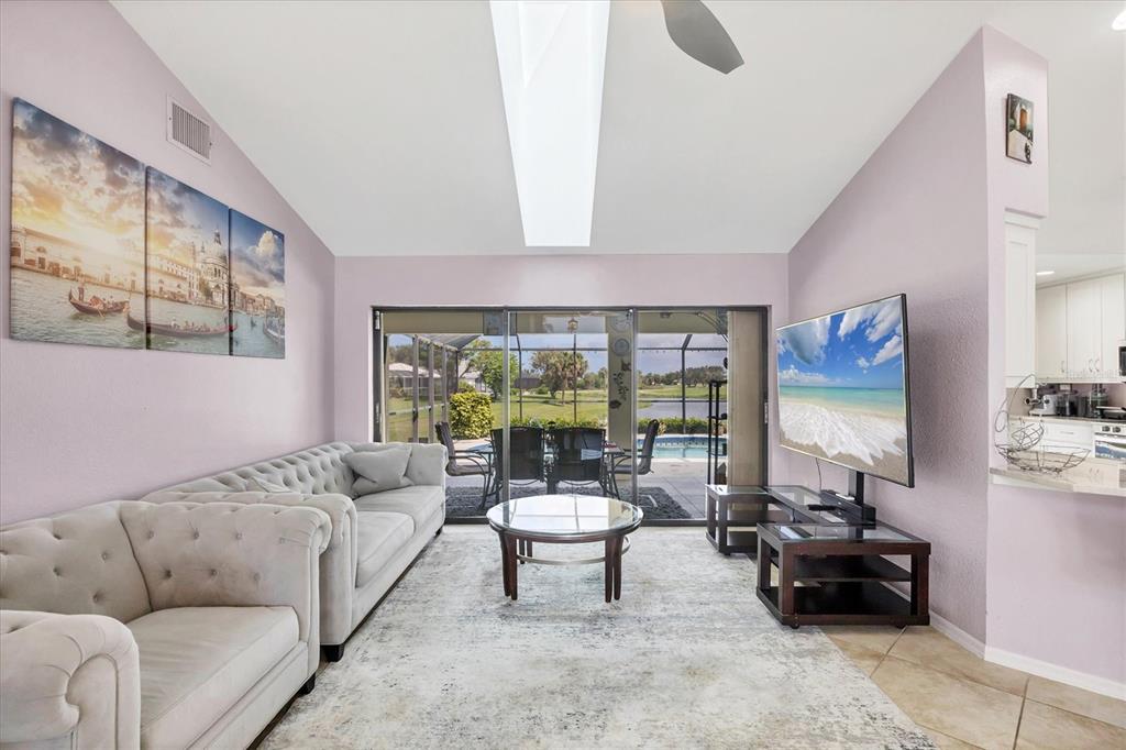 4 Leeward Drive Placida, FL 33946 - Photo 10 of 37 a living room with furniture and a large window