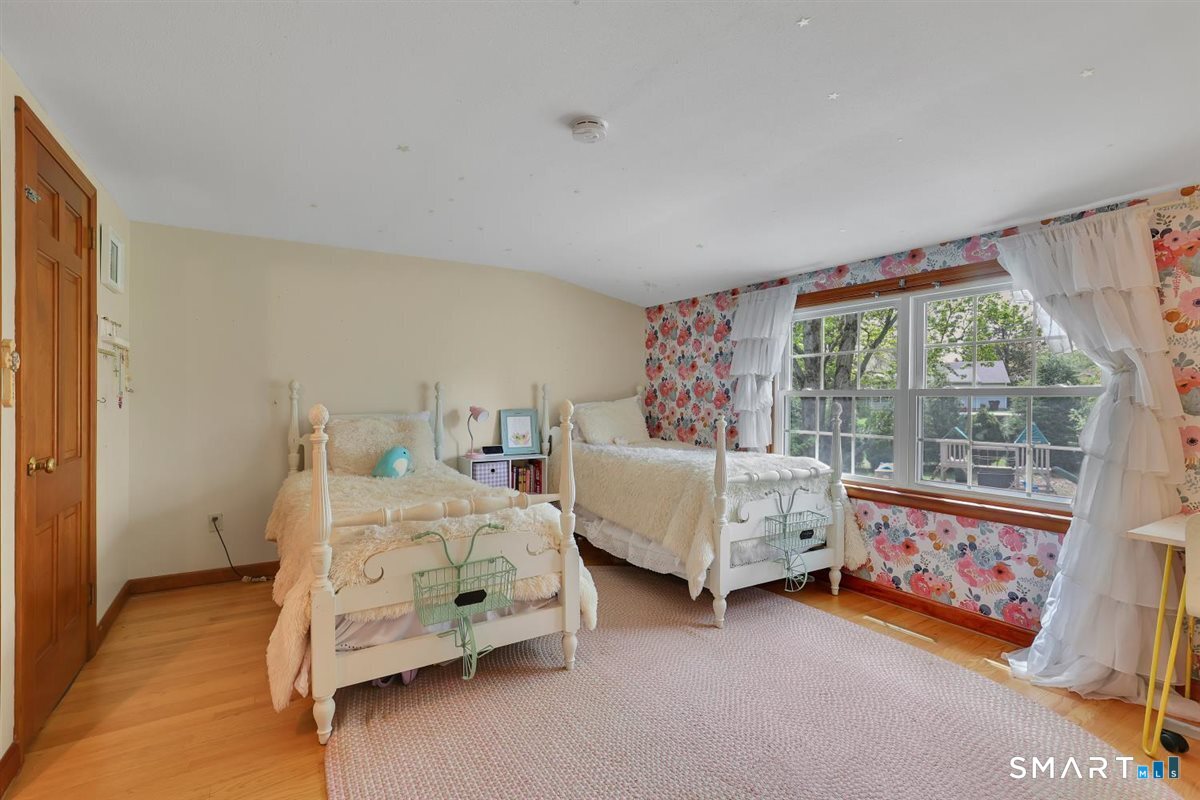 72 Old Post Road Wethersfield, CT 06109 - Photo 22 of 40 a bed room with bed and a window