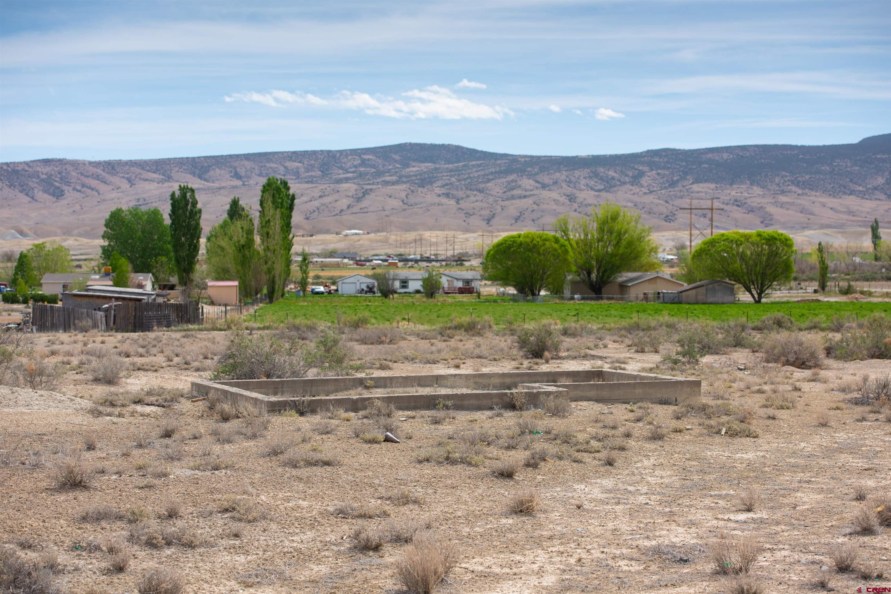 22477 F Road Delta, CO 81416 - Photo 17 of 35 a view of a field with an ocean