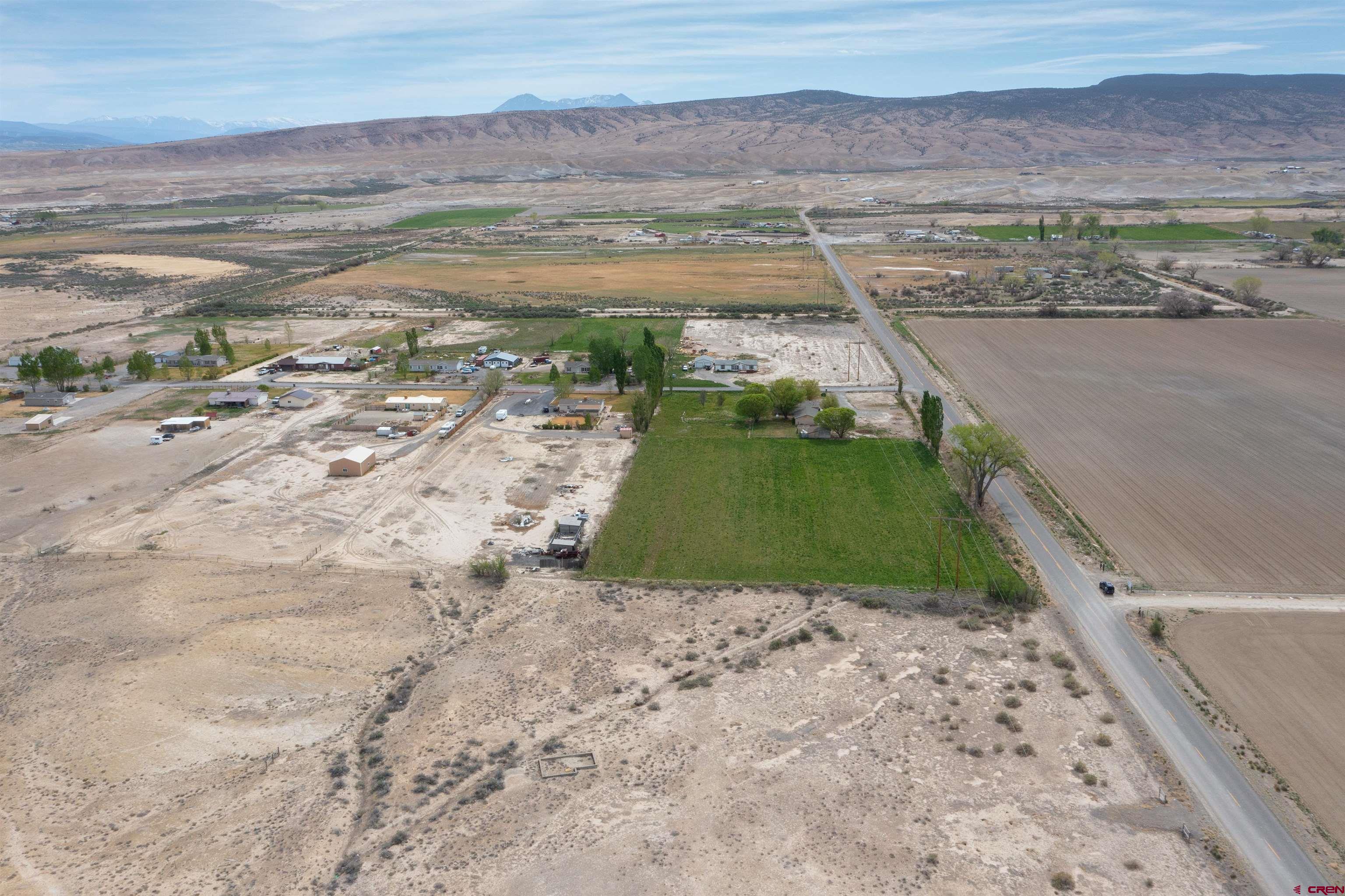 22477 F Road Delta, CO 81416 - Photo 20 of 35 a view of a lake with beach and ocean view