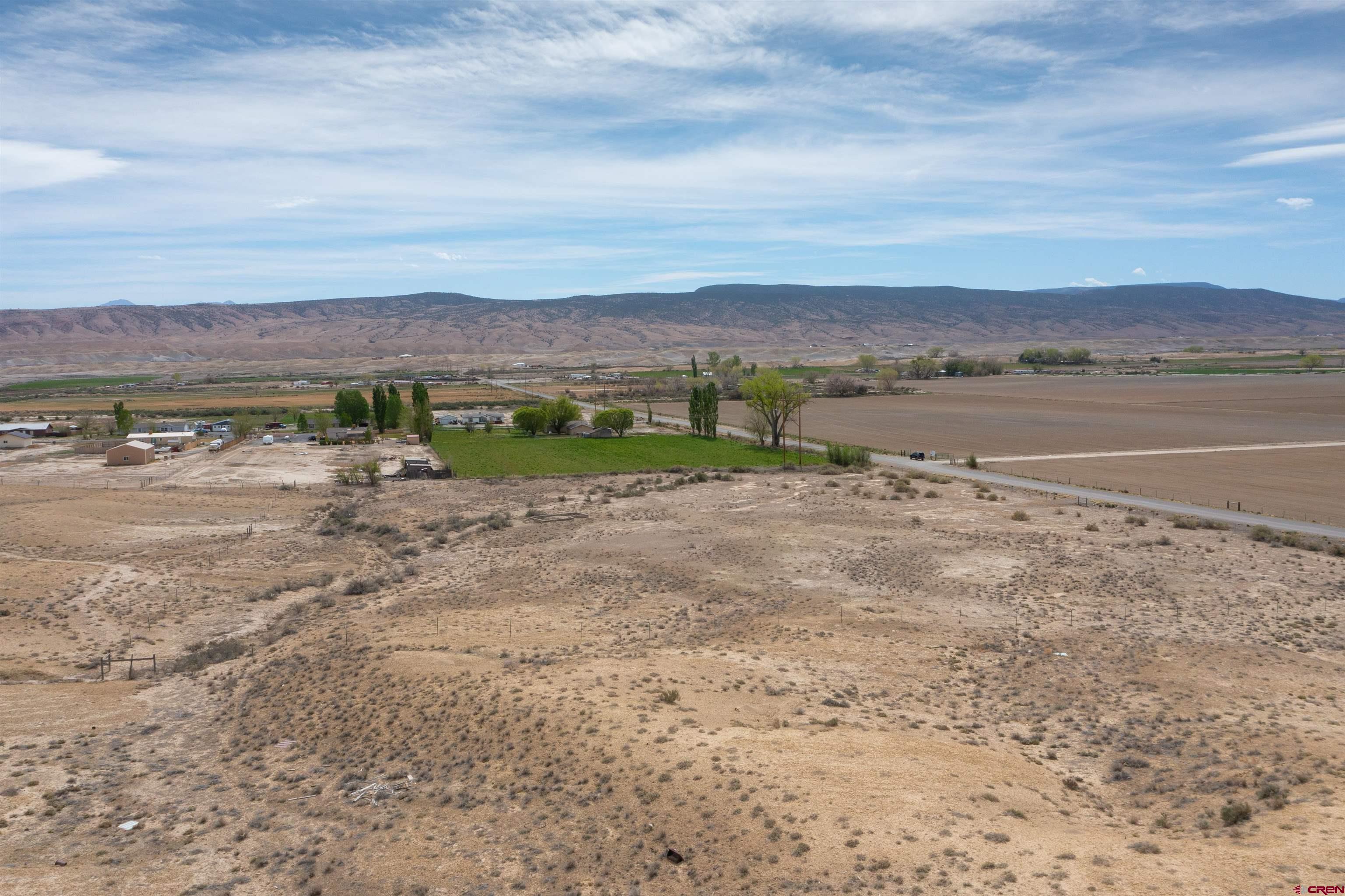 22477 F Road Delta, CO 81416 - Photo 10 of 35 a view of lake with mountain in the background