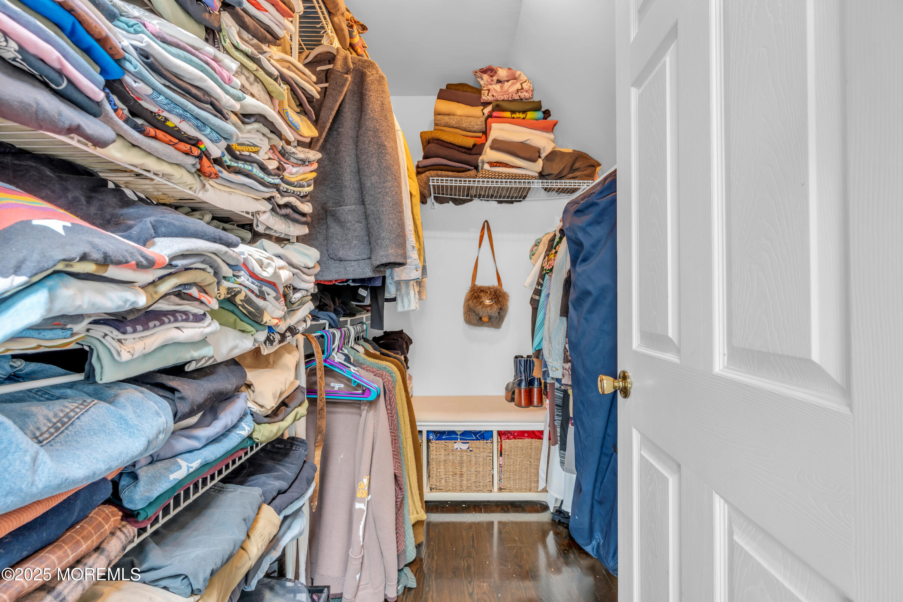 2228 Wilson Road Point Pleasant, NJ 08742 - Photo 44 of 65 a view of walk in closet with clothes and shoes