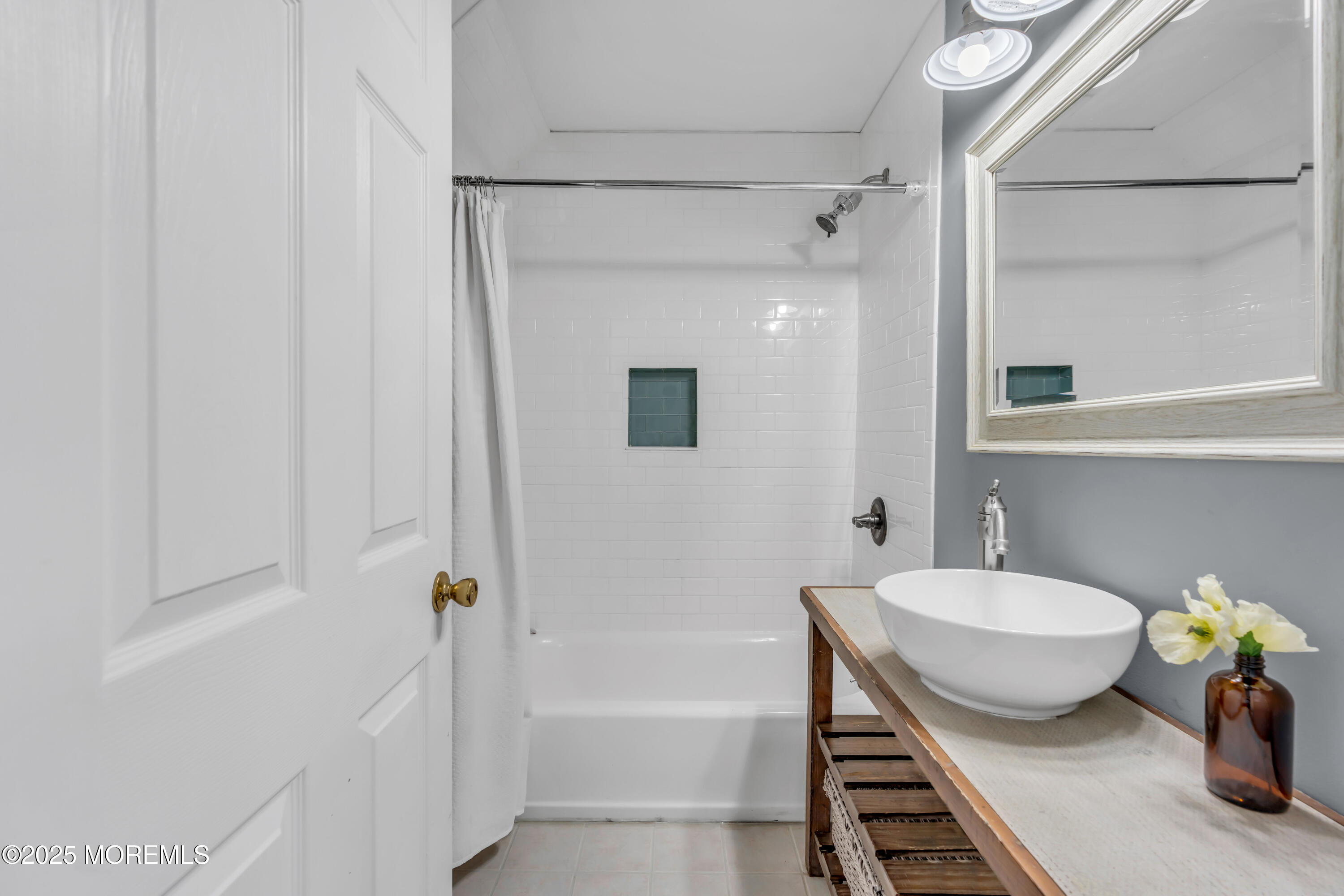 2228 Wilson Road Point Pleasant, NJ 08742 - Photo 47 of 65 a bathroom with a sink and a mirror