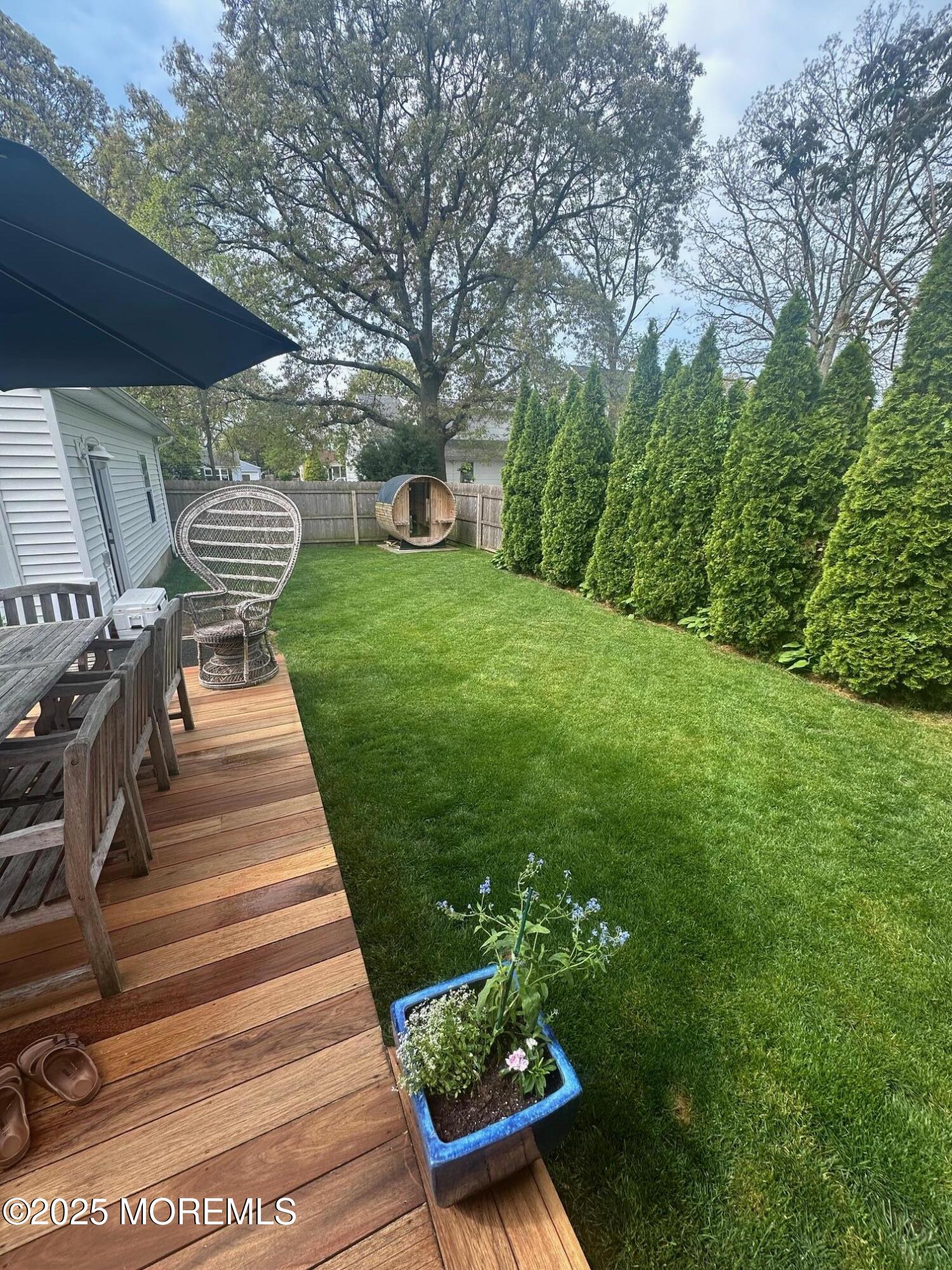 2228 Wilson Road Point Pleasant, NJ 08742 - Photo 65 of 65 a view of a backyard with sitting area