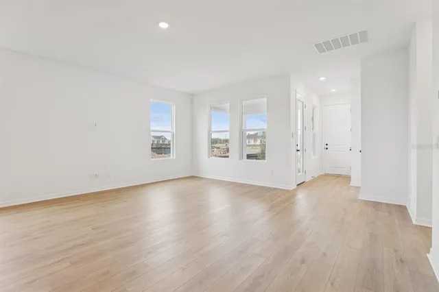 a view of a kitchen with a sink and a stove top oven