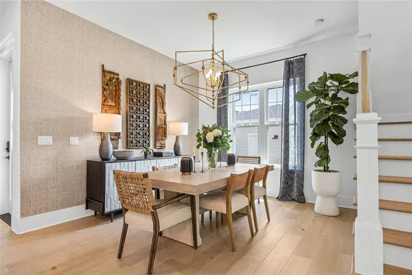 a kitchen with cabinets and window