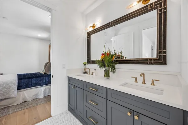 a utility room with sink dryer and washer