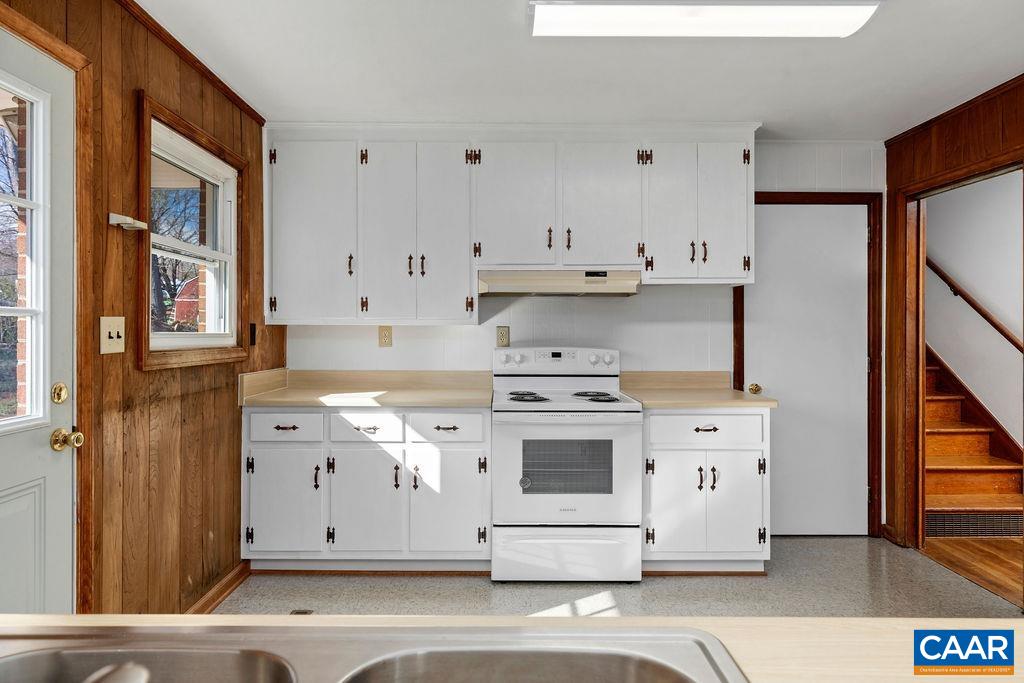 492 Avon Road Afton, VA 22920 - Photo 20 of 60 a kitchen with stainless steel appliances white cabinets and a stove