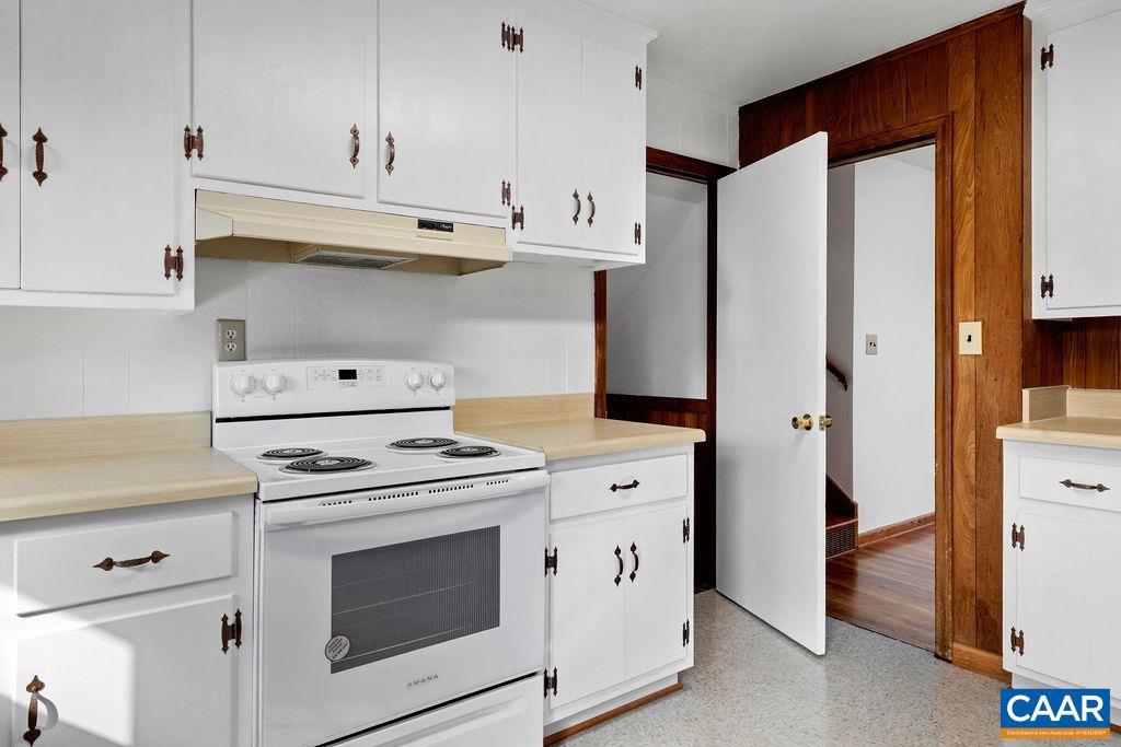 492 Avon Road Afton, VA 22920 - Photo 22 of 60 a kitchen with stainless steel appliances white cabinets and a stove a refrigerator