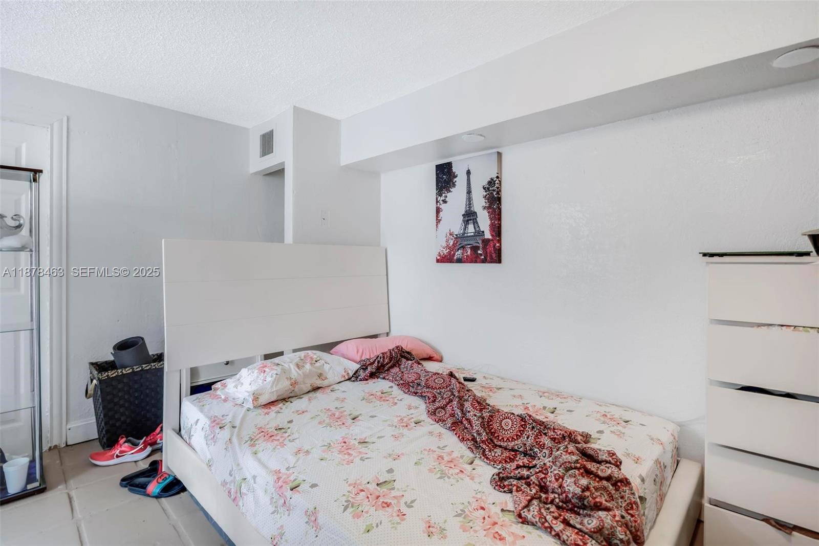 580 Southeast 2nd Street Hialeah, FL 33010 - Photo 20 of 30 a bedroom with a bed and a cabinets