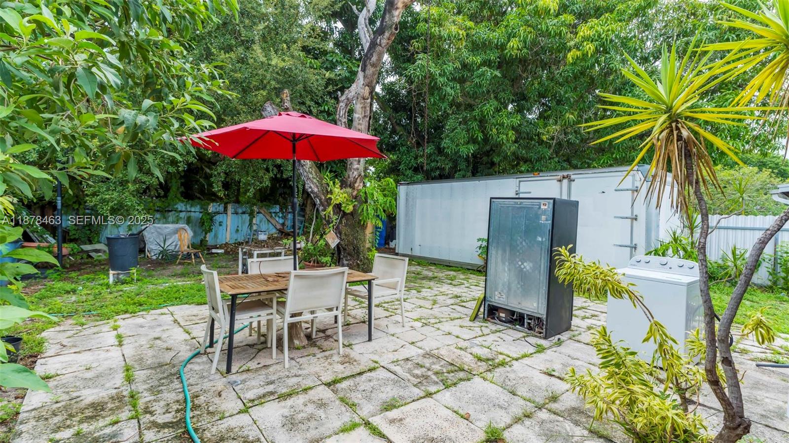 580 Southeast 2nd Street Hialeah, FL 33010 - Photo 25 of 30 a view of a backyard with furniture and a tub