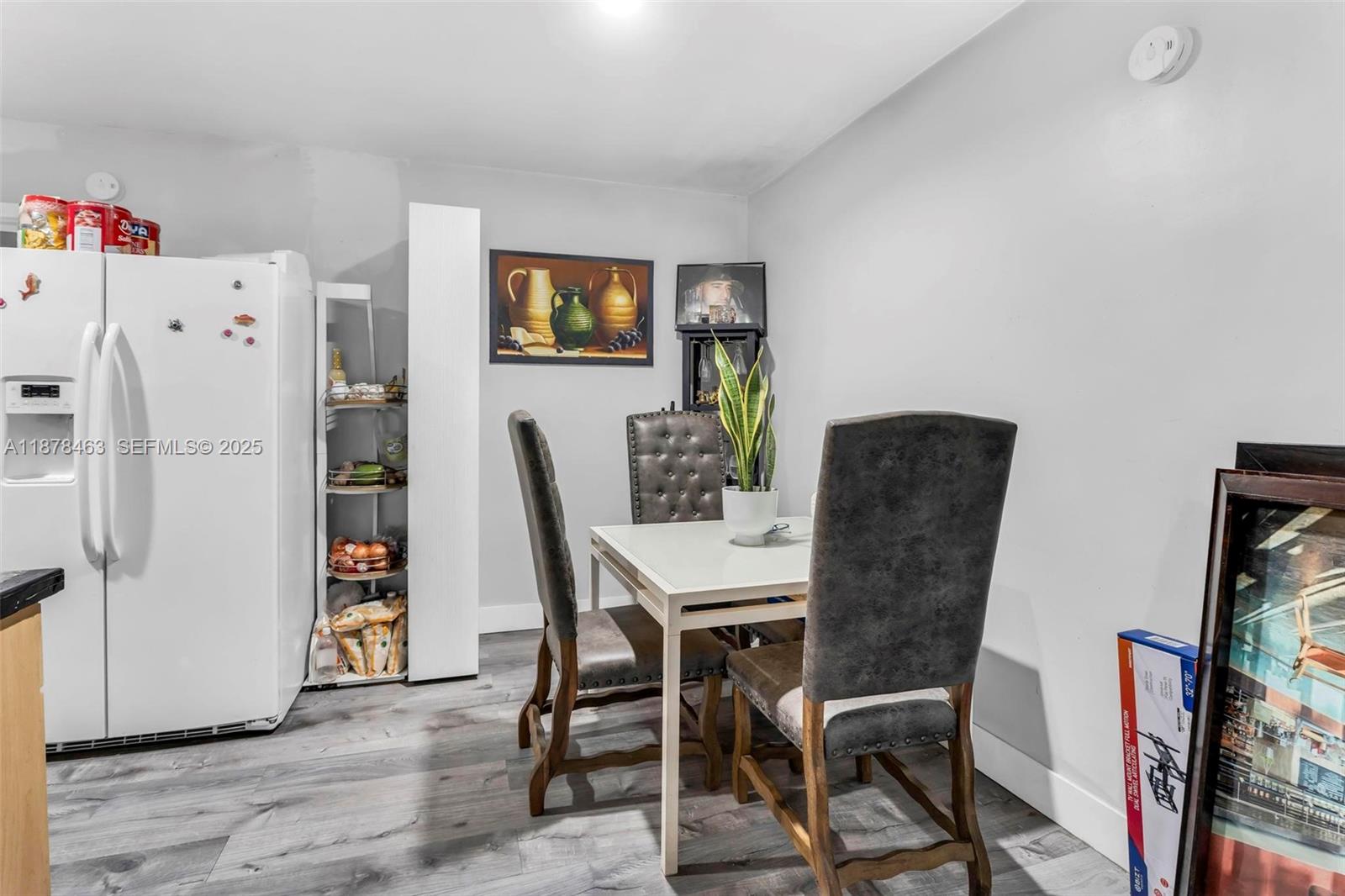 580 Southeast 2nd Street Hialeah, FL 33010 - Photo 5 of 30 a dining room with furniture and wooden floor