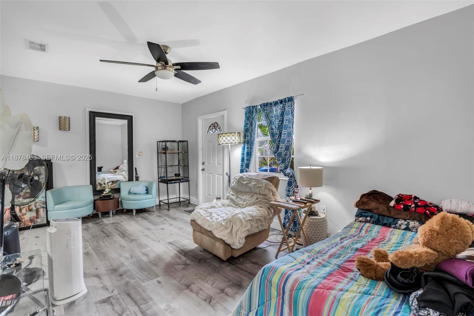 580 Southeast 2nd Street Hialeah, FL 33010 - Photo 10 of 30 a bedroom with two beds and a couch