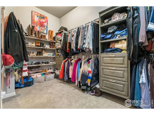 a bedroom with a bed and furniture