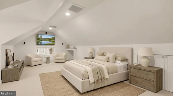 a spacious bedroom with a bed and window