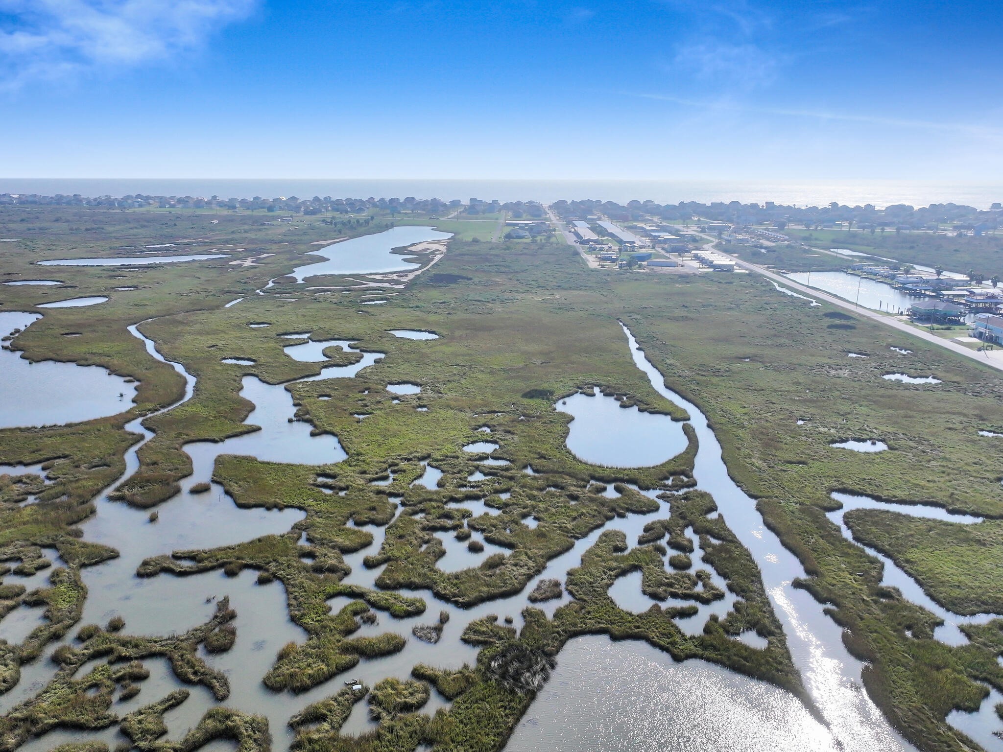 0 Middle Reef Drive Crystal Beach, TX 77650 - Photo 10 of 17 an aerial view of a house