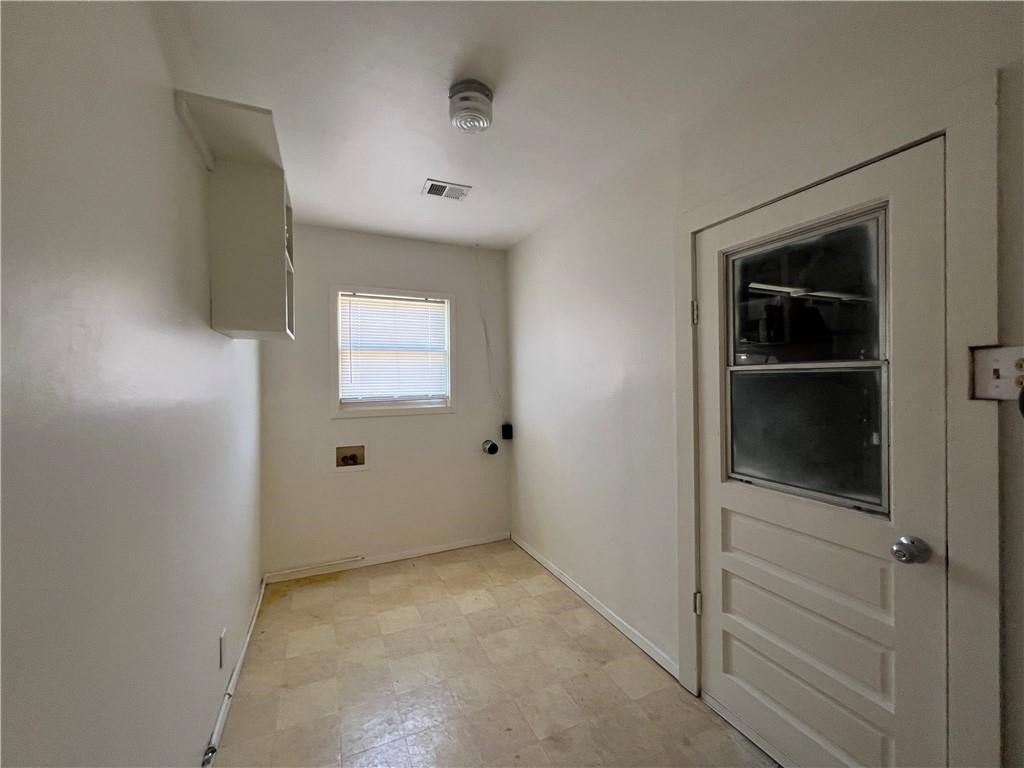 3662 Austin Street Corpus Christi, TX 78411 - Photo 13 of 22 a view of an empty room with closet and a window