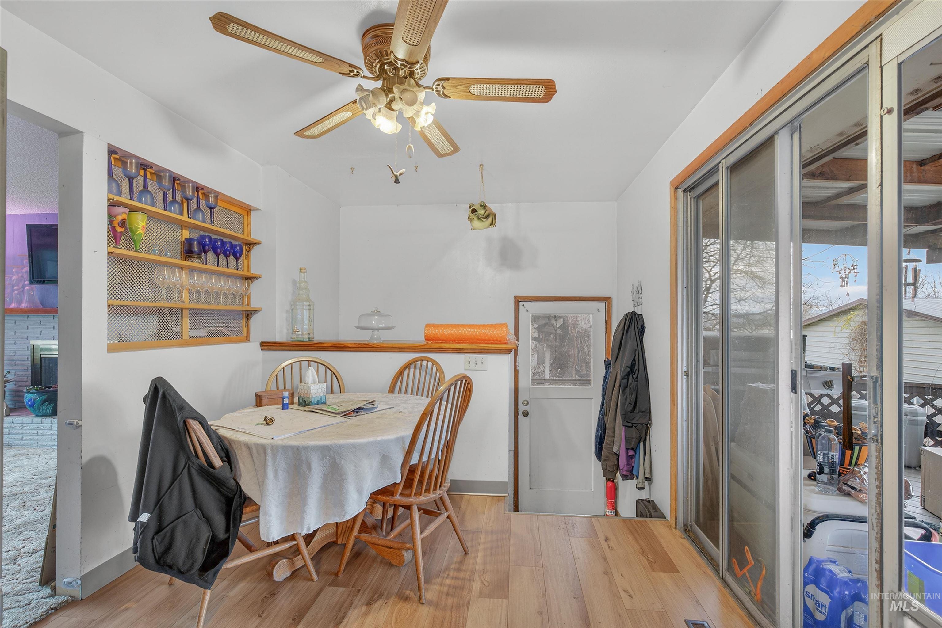 3508 8th Street Lewiston, ID 83501 - Photo 9 of 28 Dining room featuring light wood-style floors and ceiling fan