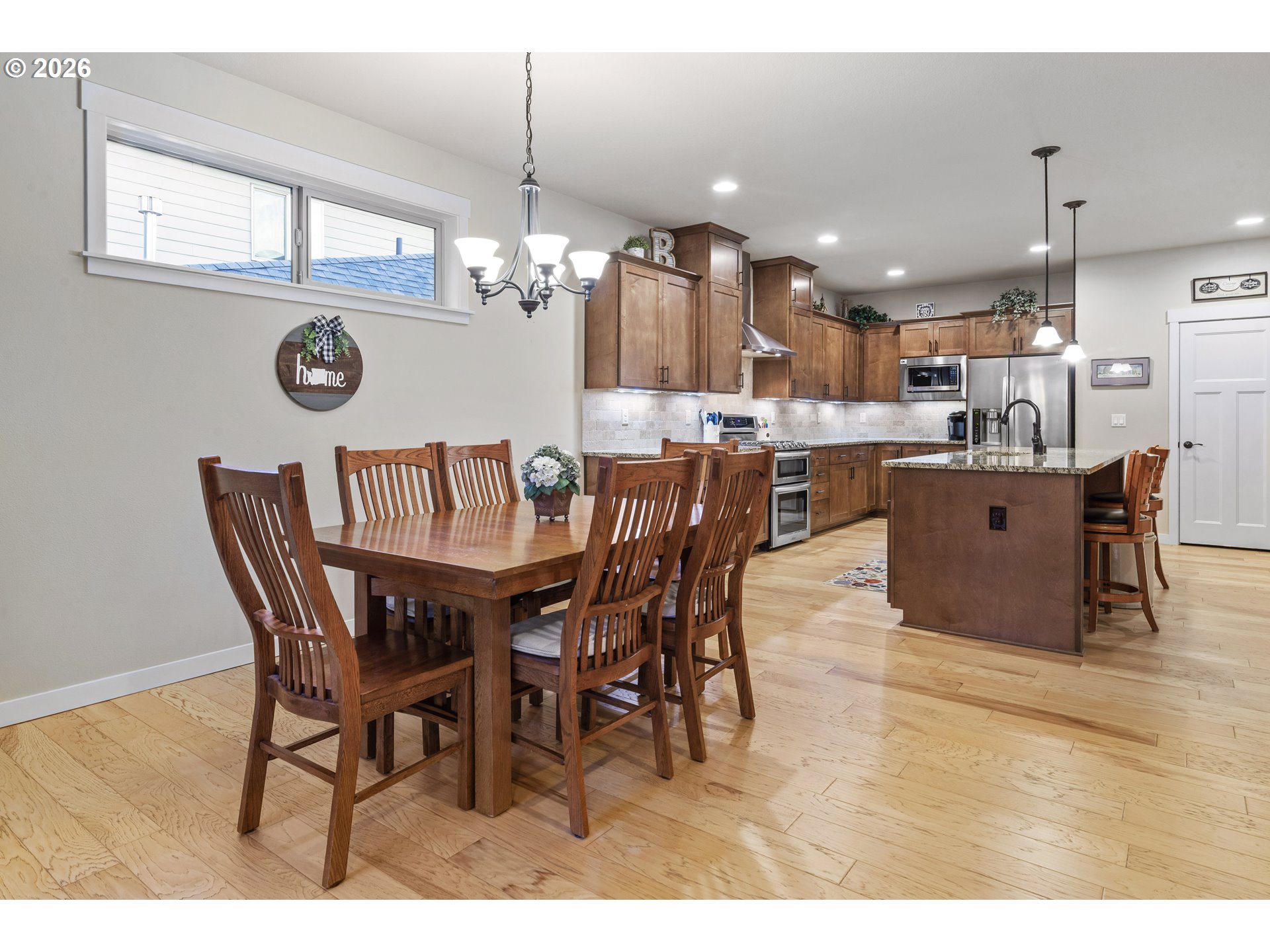 3110 Northeast 174th Street Ridgefield, WA 98642 - Photo 12 of 36 a view of a dining room and livingroom