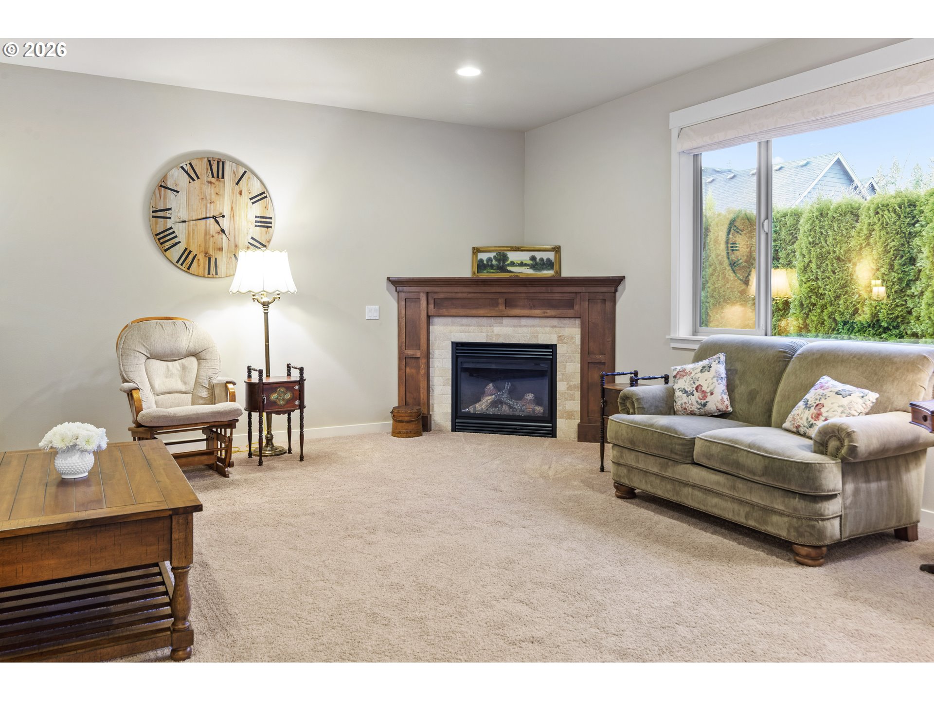 3110 Northeast 174th Street Ridgefield, WA 98642 - Photo 14 of 36 a living room with furniture and a fireplace