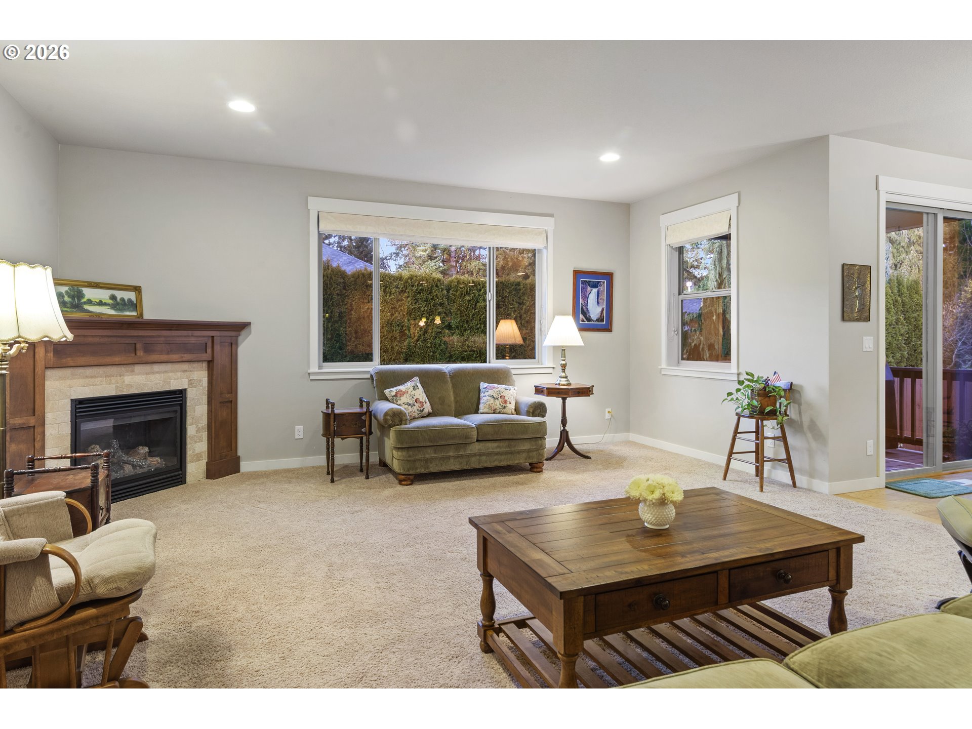 3110 Northeast 174th Street Ridgefield, WA 98642 - Photo 17 of 36 a living room with furniture and a fireplace