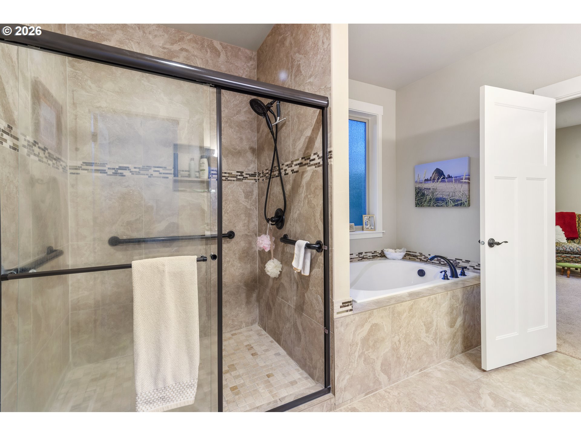 3110 Northeast 174th Street Ridgefield, WA 98642 - Photo 24 of 36 a bathroom with a tub sink and mirror
