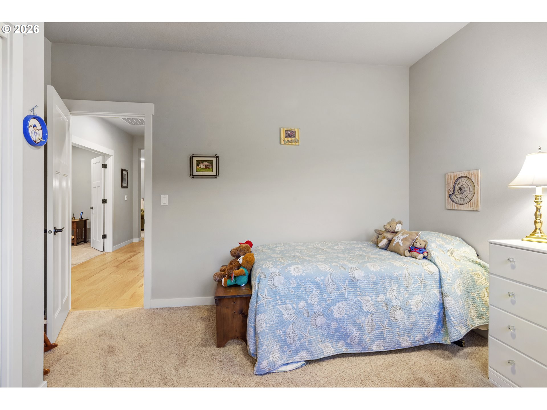 3110 Northeast 174th Street Ridgefield, WA 98642 - Photo 27 of 36 a bed room with a bed and a dresser