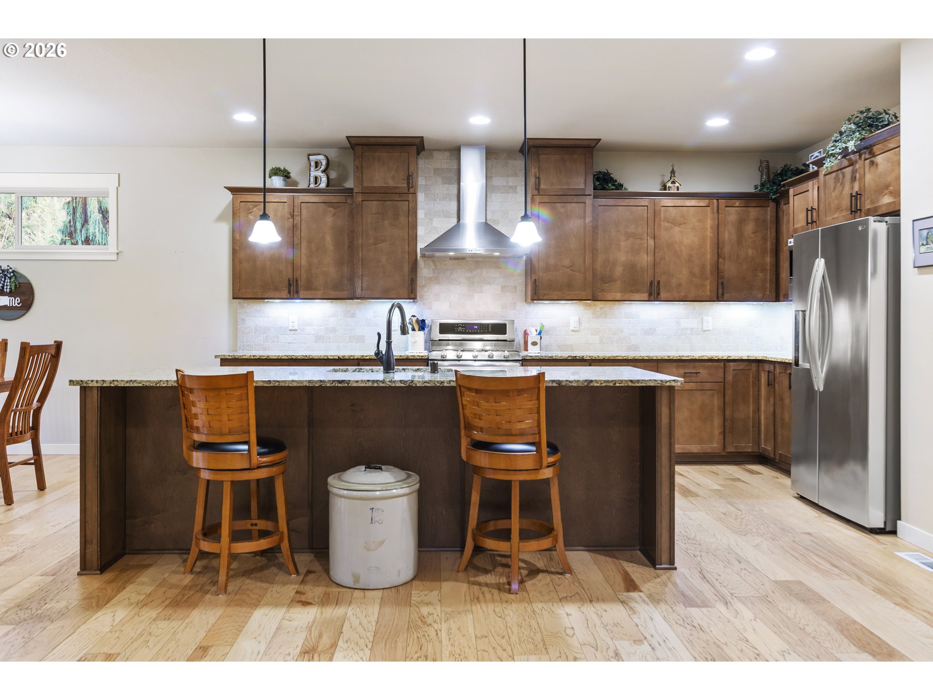 3110 Northeast 174th Street Ridgefield, WA 98642 - Photo 7 of 36 a kitchen with a sink cabinets and window