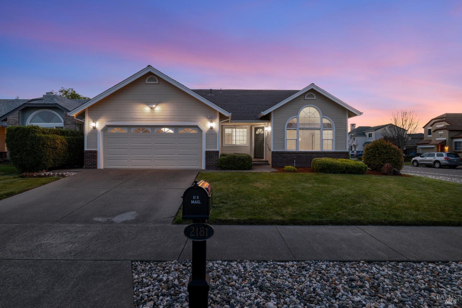 2181 Erika Street Santa Rosa, CA 95403 - Photo 1 of 1 a front view of a house with a yard and garage