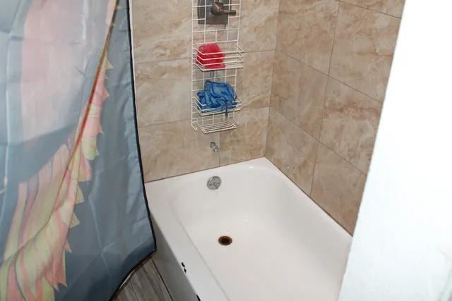 a bathroom with a bathtub