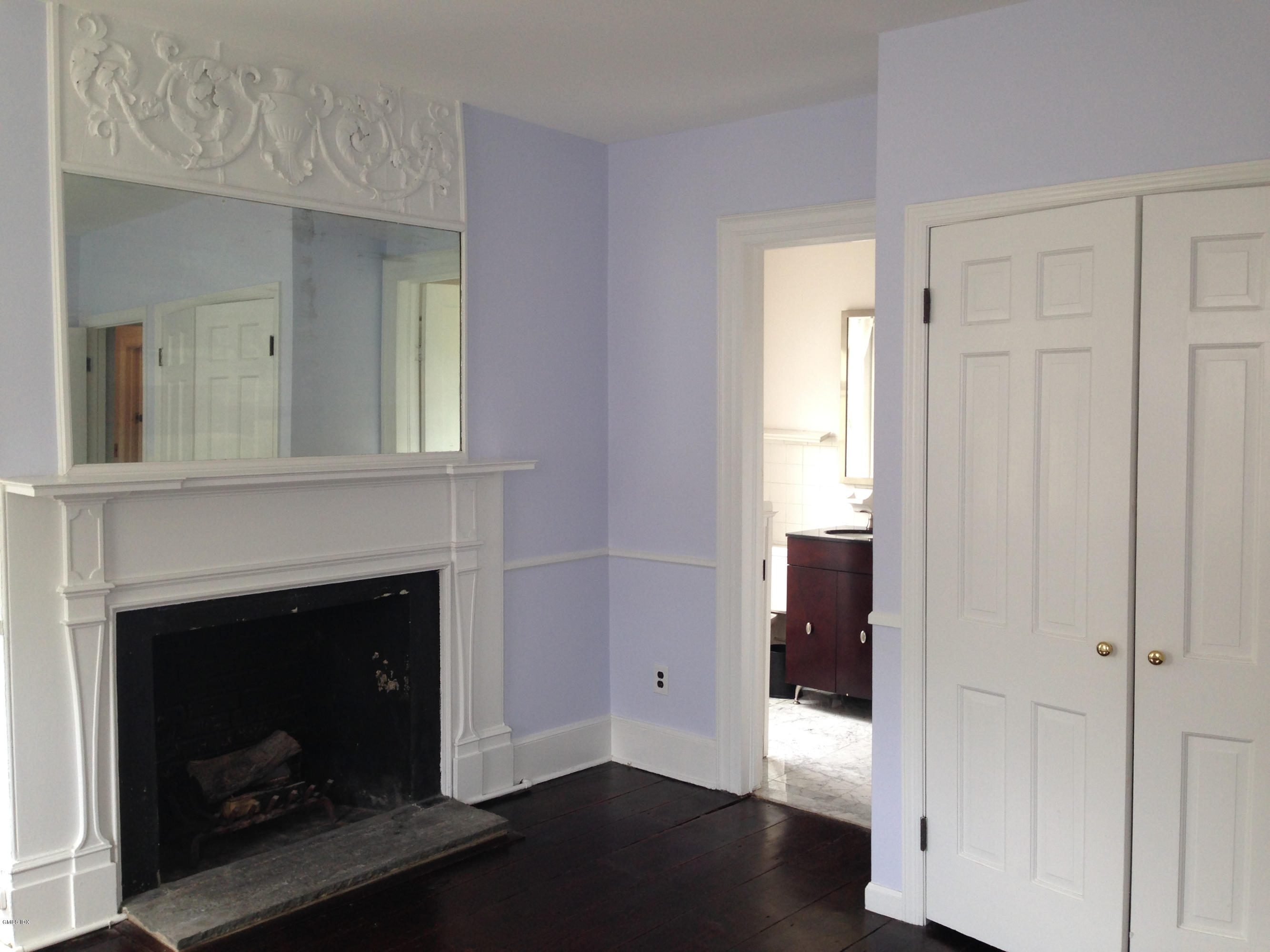49 Valley Road, Unit A3 Cos Cob, CT 06807 - Photo 4 of 17 a view of a livingroom with a fireplace