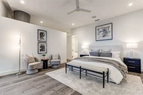 a bedroom with a bed and furniture