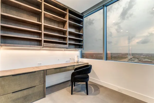 a room with a desk and a chair