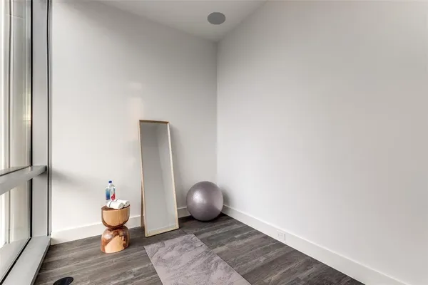 a view of a livingroom with wooden floor