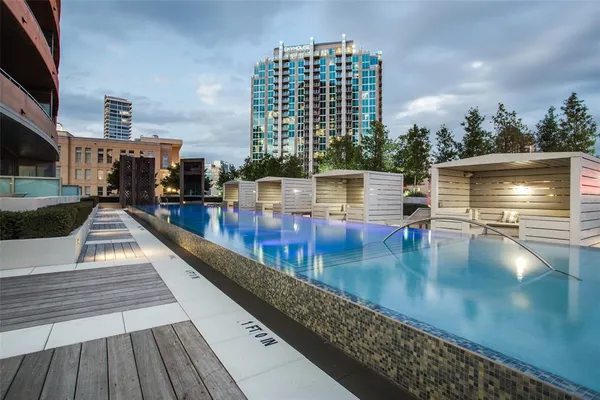 a view of swimming pool from a balcony