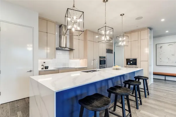 a kitchen with a table and chairs in it