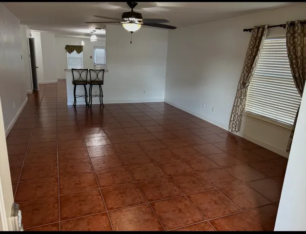 a view of a livingroom with a furniture