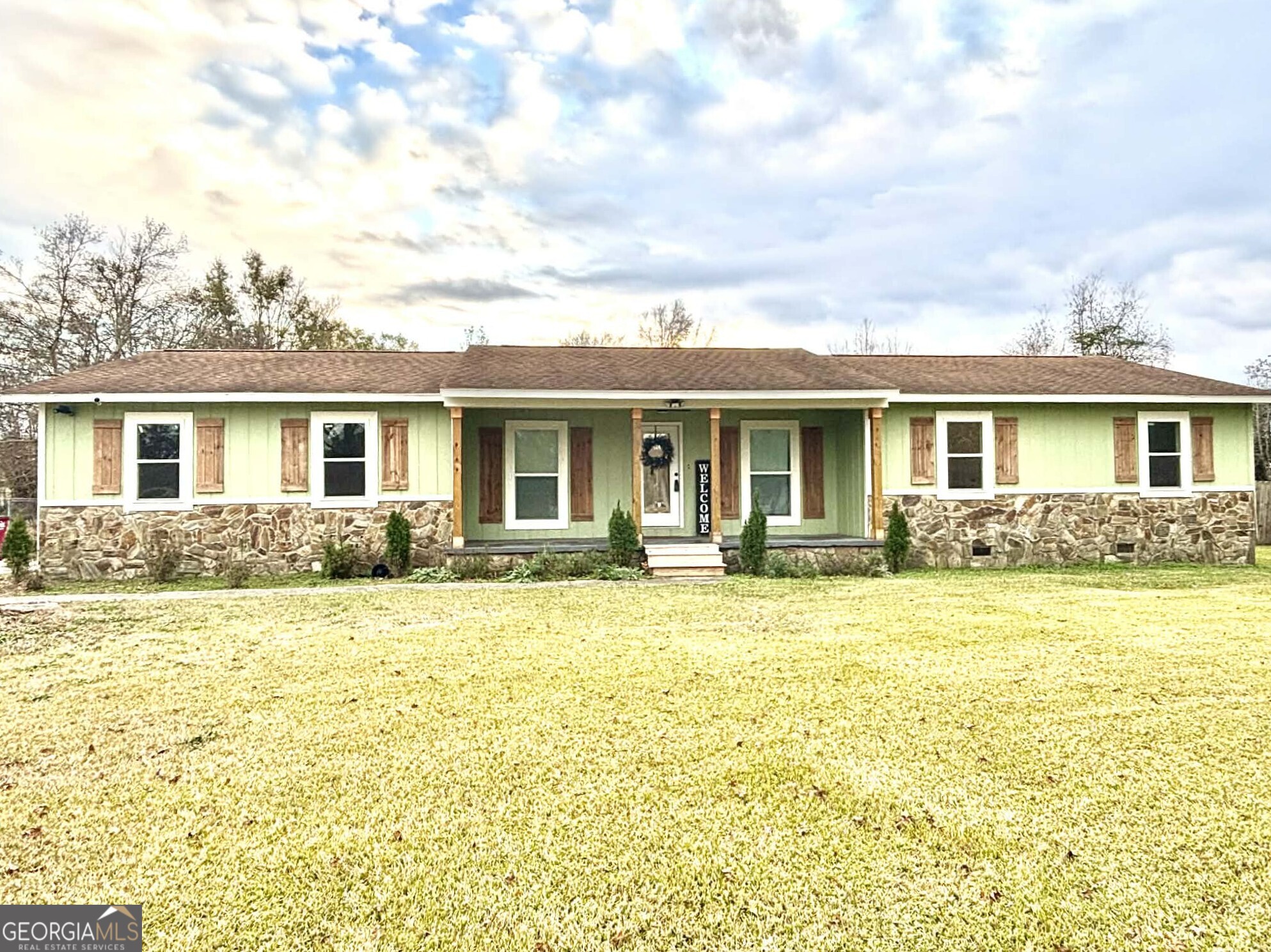 a view of a house with swimming pool