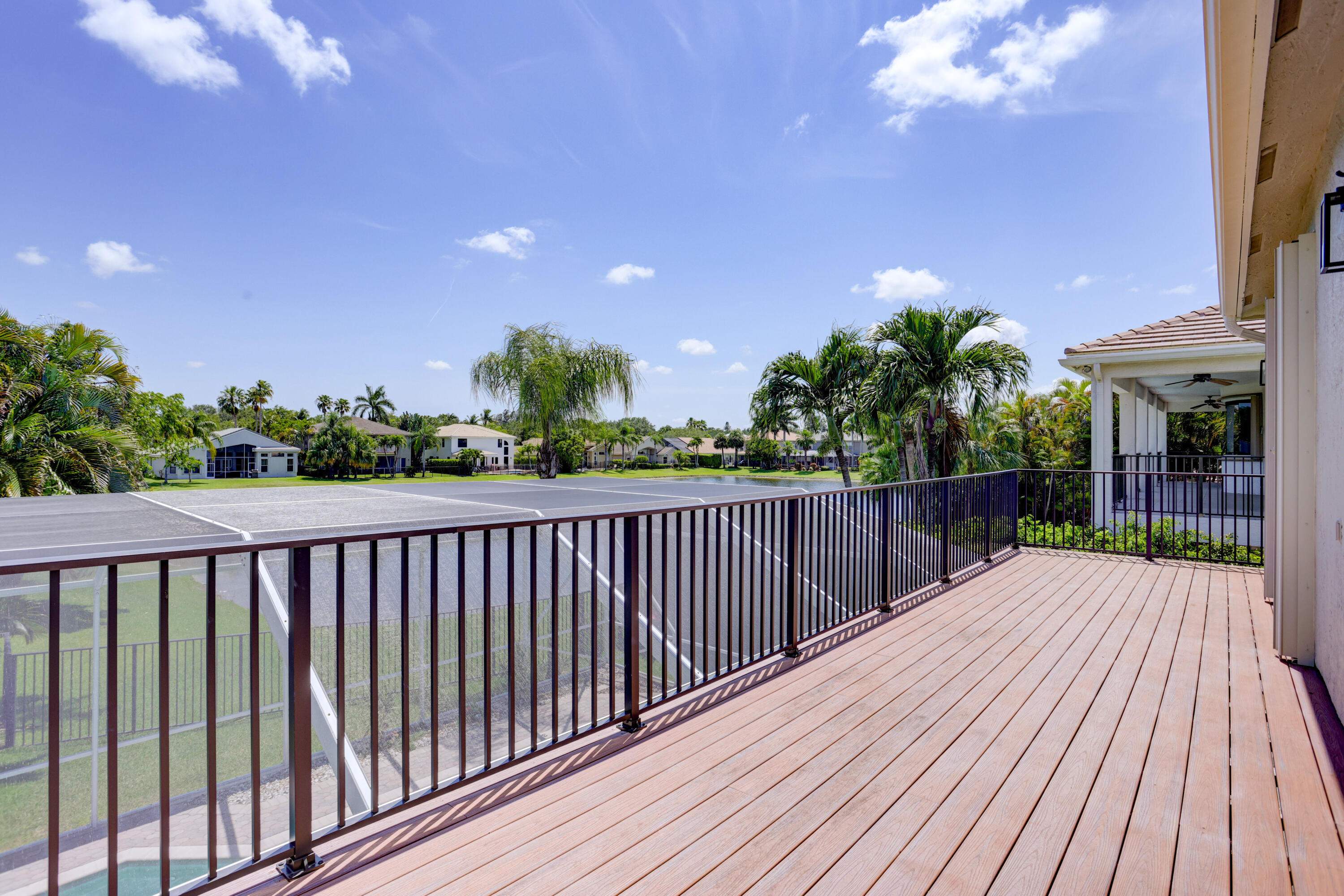 19644 Estuary Drive Boca Raton, FL 33498 - Photo 38 of 43 a view of balcony with wooden floor and outdoor seating