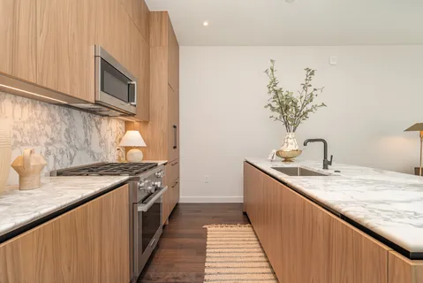 a kitchen with a sink and a stove