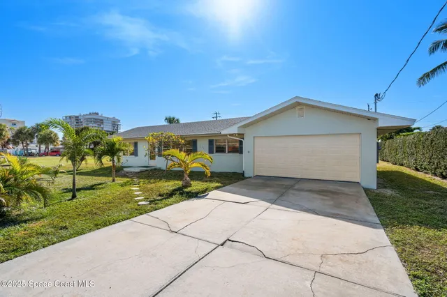 a front view of house with yard