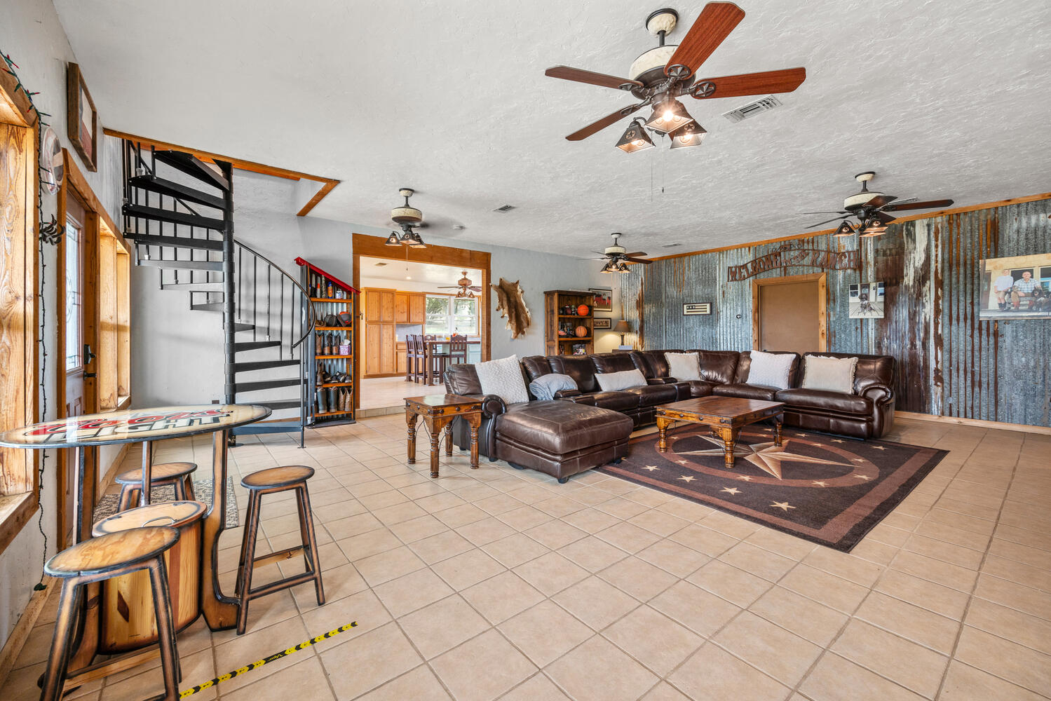 3487 Rust Spring Branch, TX 78070 - Photo 7 of 40 Breakfast/beverage area. Note the spiral staircase! (Sadly, too close to the wall to slide down the railing.)